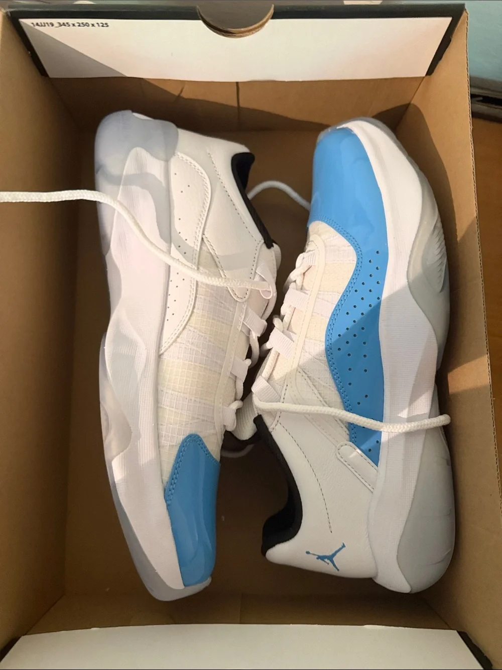 Jordan mens Low Top Sneakers in White and Sky Blue